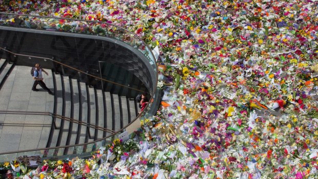 Thousands of floral tributes left in Martin Place following the Lindt cafe siege in 2014.