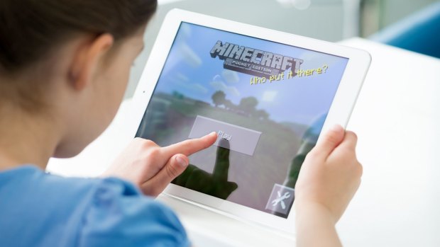 A children entering the virtual world of Minecraft.