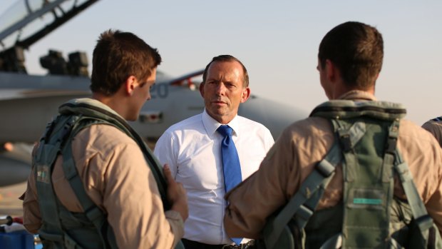 Then prime minister Tony Abbott speaks with ADF personnel in the United Arab Emirates.