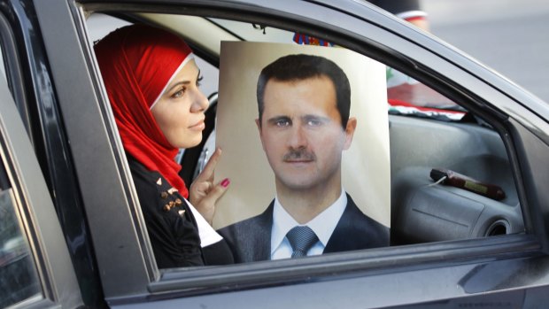 A celebration of President Bashar al-Assad's birthday in Damascus in 2013. 