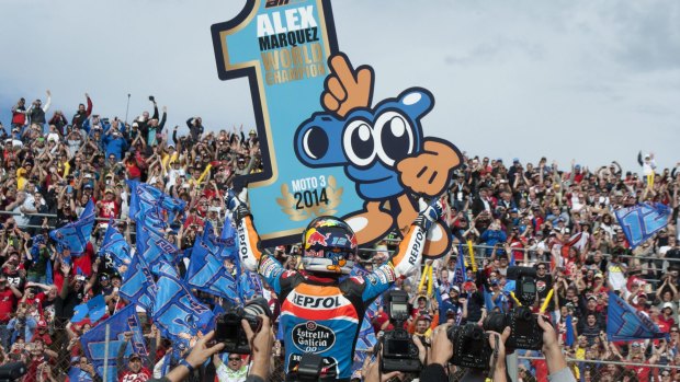 Spanish rider Alex Marquez celebrates after winning the title after the Moto3 Valencia Grand Prix in Cheste, near Valencia, on Sunday.