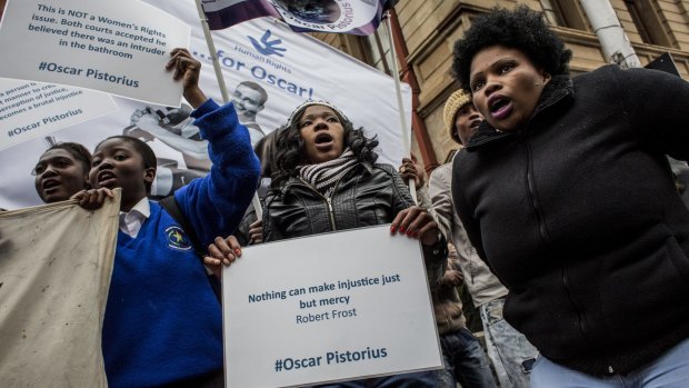 Oscar Pistorius supporters gather opposite North Gauteng High Court.