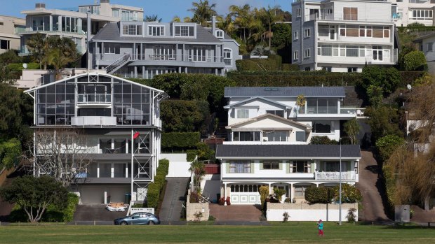 Houses stand in the suburb of Saint Heliers in Auckland, New Zealand.