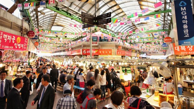 The famous Gwangjang Market in Seoul, South Korea. Korean scenes: The people, the vendors, and the amazing street food.