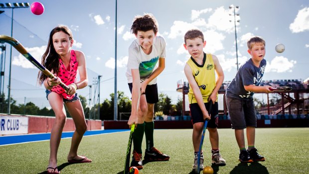 Hockey ACT will launch two modified versions of the game in February in a bid to revitalize the sport in the capital. From left, Alyssa Smith 11, Daniel Leivesley 14, Liam Carter 5, and Cameron Mills 10.
