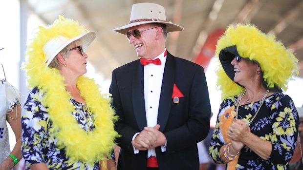 The race meeting showcased many colourful outfits.