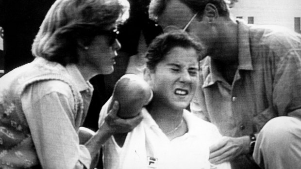 The moment tennis changed forever: Monica Seles reacts after being stabbed in the back by a Steffi Graf fan in 1993.