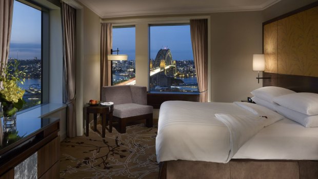 $1550 a night: Bedroom of the executive grand harbour view suite at the Shangri-La hotel in Sydney.