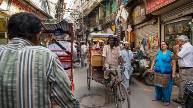 Take a trishaw ride through the narrow streets of Old Delhi.