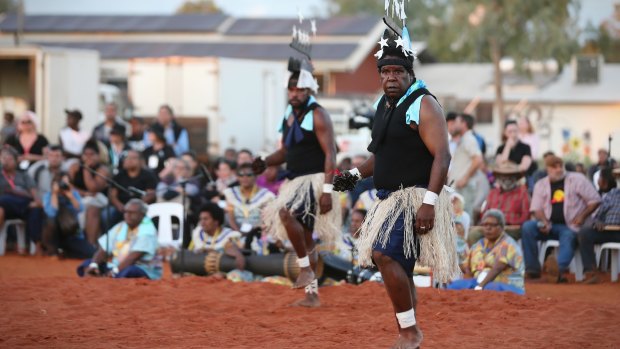 Performers from Muakgau Lak Gubau Gizu (Thursday Island) at Mutitjulu on Tuesday. 