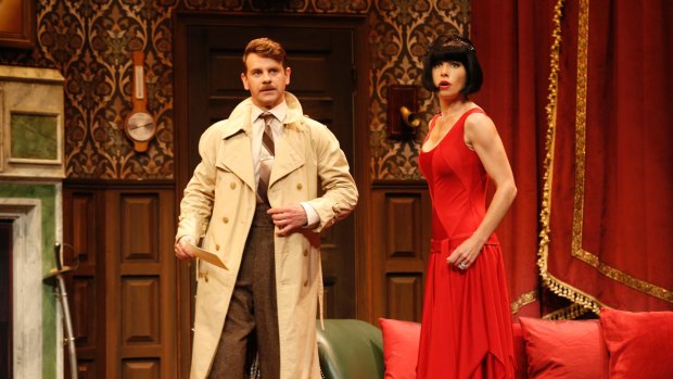 Nick Simpson-Deeks (Chris) and Brooke Satchwell (Sandra) in <i>The Play That Goes Wrong</i>. 