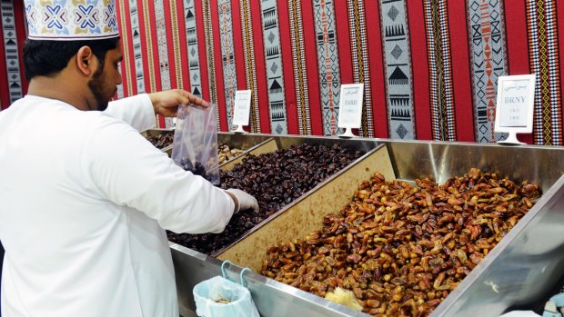 A colourful date shop at the Nizwa market in Oman.