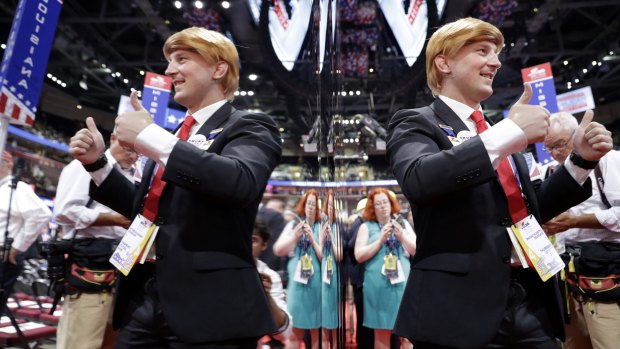 Massachusetts delegate Jimmy Davidson poses dressed as Republican presidential candidate Donald Trump during the final day of the Republican National Convention in Cleveland.