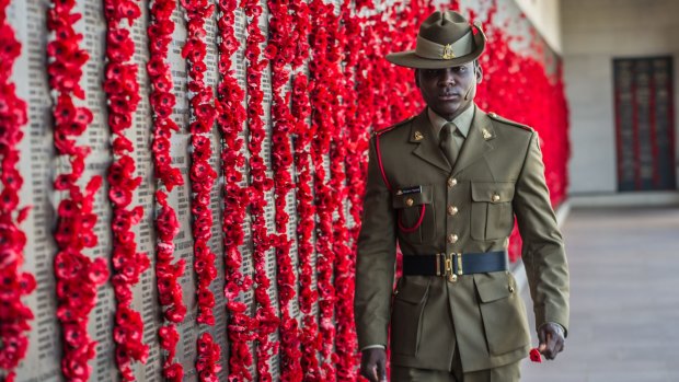 Private Theogene Ngamije joined the Australian Army to "pay back" the "beautiful nation, specifically the peacekeeping soldier that helped me." 