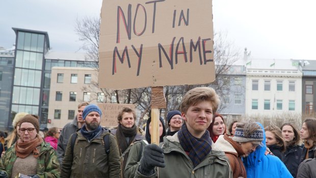 People protest in front of Iceland's Parliament in Reykjavik on Tuesday after the leak of millions of records on offshore accounts claimed its first high profile victim, the country's prime minister.