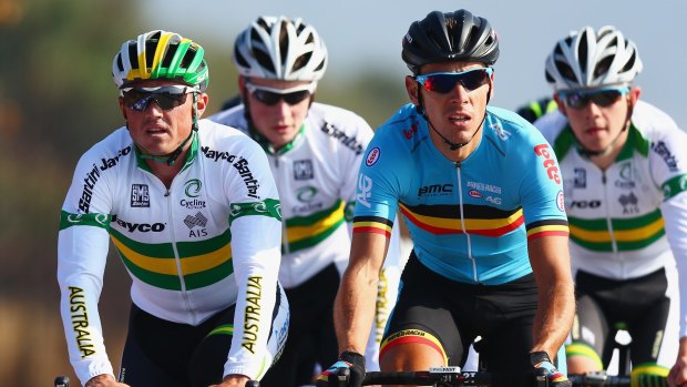 Having his say: Simon Gerrans (left) rides during training for the UCI World Road Race Championships.