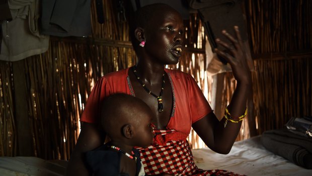 Keeping malnutrition at bay is  a major problem for mothers and their children, such as Martha Nyambol, 28, and her seven-month-old baby Nyall Koang.