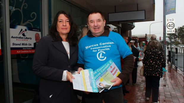 Former Lindsay MP Jackie Kelly at the Penrith pre-poll centre with conservative Independent candidate and fellow former Liberal Party member, Marcus Cornish.