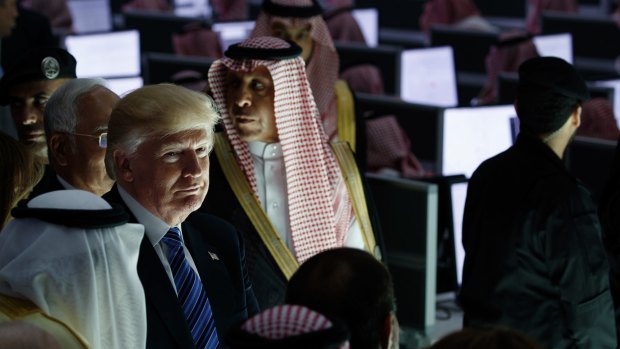 President Donald Trump listens during a ceremony to mark the opening of the Global Center for Combating Extremist Ideology in Riyadh on Sunday.