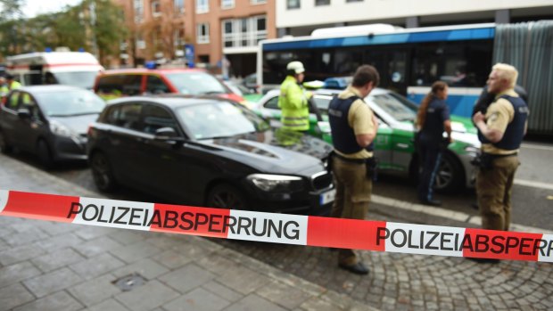 Police guard the area at Rosenheimer Platz square in Munich, Germany.