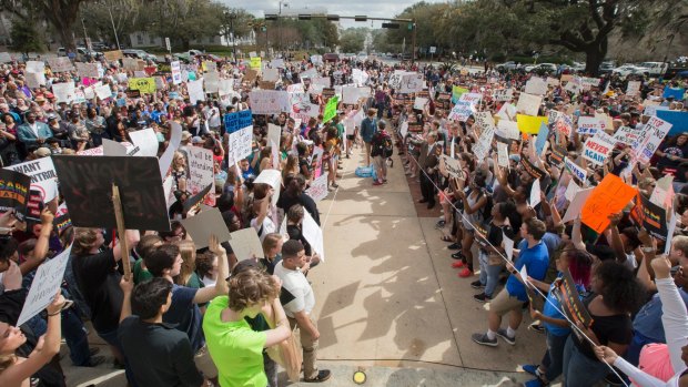 Students gather on the steps of the old Florida Capitol protesting gun violence in Tallahassee, Florida.