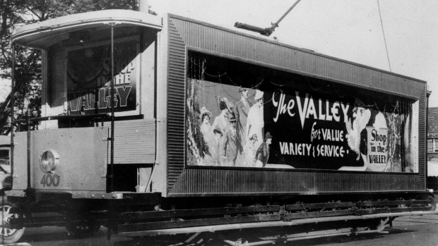 Brisbane tram featuring advertisement for Fortitude Valley shopping.