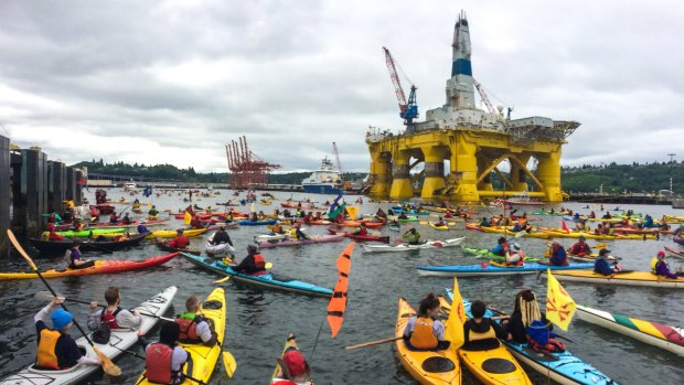 Activists surround Shell's Polar Pioneer at the Port of Seattle to protest arctic drilling.