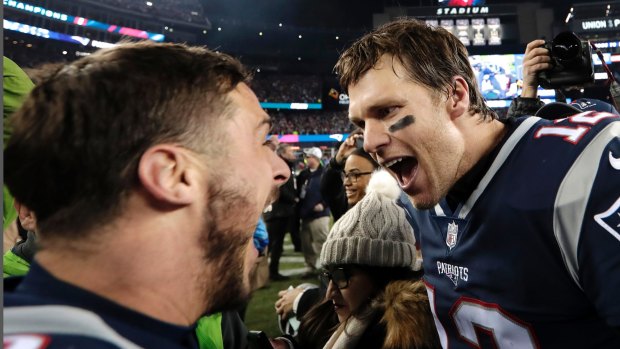Tom Brady, left, celebrates with Danny Amendola after the New England Patriots beat the Jacksonville Jaguars in the AFC championship NFL football game.