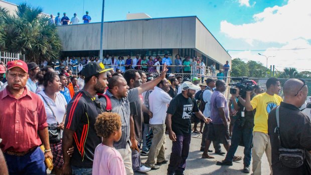 Family, friends and supporters of students injured during a government protest gather outside Port Moresby General Hospital on Wednesday.