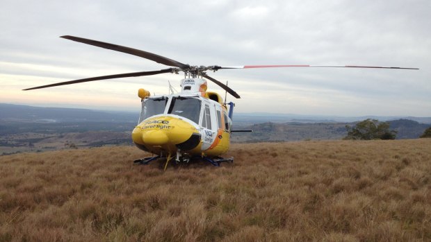 The RACQ Careflight Rescue Helicopter on Table Top Mountain where a man was stranded for three days.