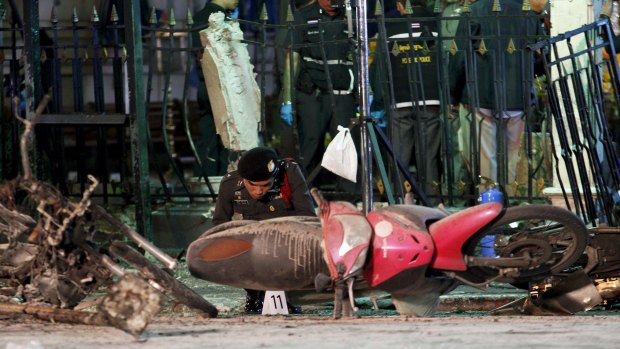 Searching: The bomb that exploded on August 17 is of a different order to devices used in previous attacks in Thailand.