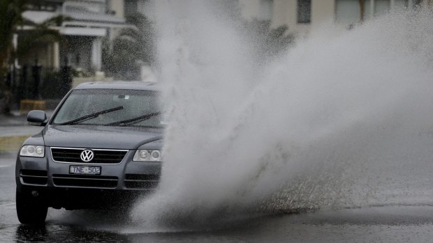 Minor flash flooding is causing traffic snarls across Melbourne.