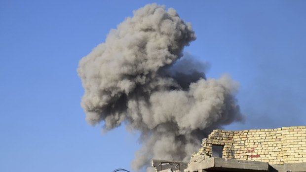 Smoke rises from Islamic State positions following a US-led coalition airstrike in Ramadi.