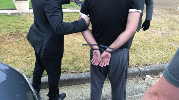 A Warwick Farm man, 30, was arrested on Friday in relation to the alleged importation of $10 million worth of the drug known as liquid ecstasy or 'coma in a bottle'.