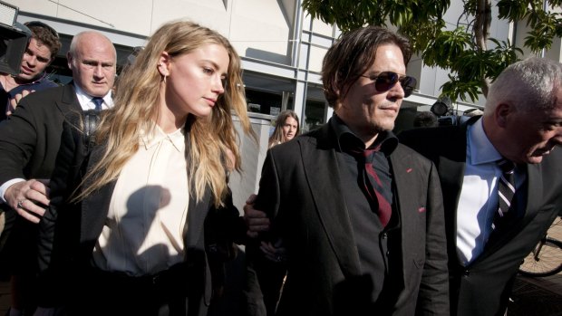 Actors Johnny Depp and wife Amber Heard leaving Southport Magistrates Court on Monday.