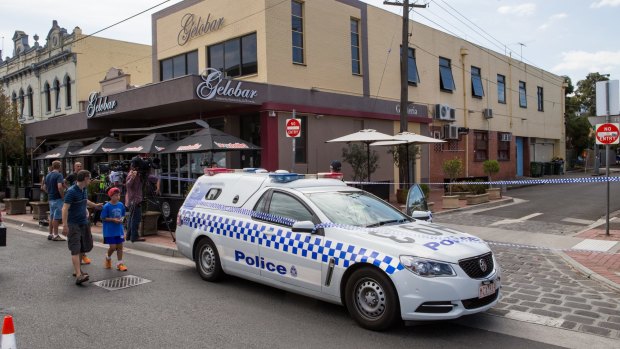 Police outside Joseph Acquaro's Gelato bar in Brunswick East.