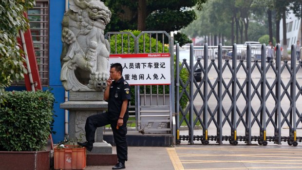 A security guard at the Ganzhou Huajian International Shoe City Co, which has been used by Ivanka Trump's brand.