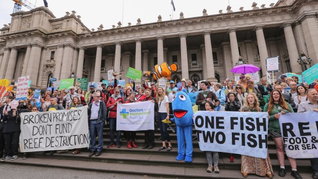 Environmentalists at a 2016 rally urge Prime Minister Malcolm Turnbull to reject a deal on the Adani coal mine.