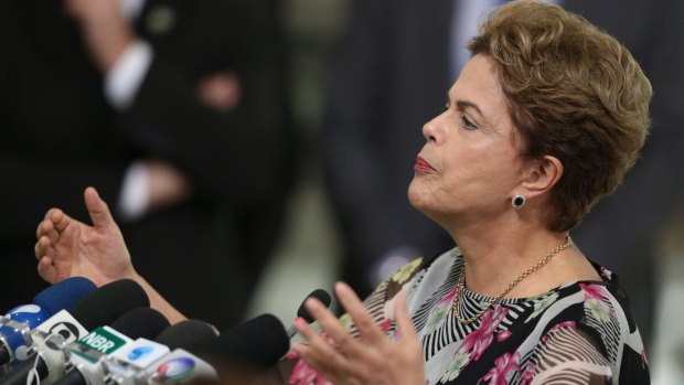 Brazilian President Dilma Rousseff speaks about proposed budget cuts during a press conference at the Planalto Presidential Palace in Brasilia. 