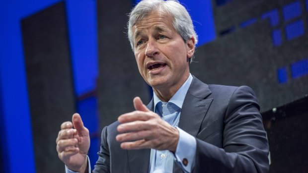 Chief executive Jamie Dimon told analysts that investors were adjusting to China's slowdown, and said there were winners and losers in the commodity rout.