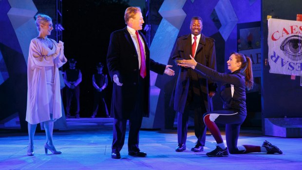 Tina Benko, left, in the role of Caesar's wife, Calpurnia, and Gregg Henry, centre left, portrays Julius Caesar during a dress rehearsal of the Public Theater's   production of <i>Julius Caesar</i>.