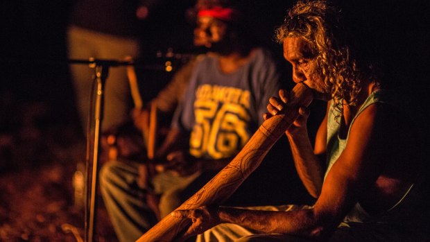 Bart Willoughby plays didgeridoo during an intimate concert at Frog Hollow community. 
