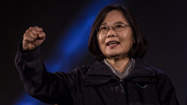 Tsai Ing-wen waves to supporters during a rally campaign ahead of the Taiwanese presidential election.
