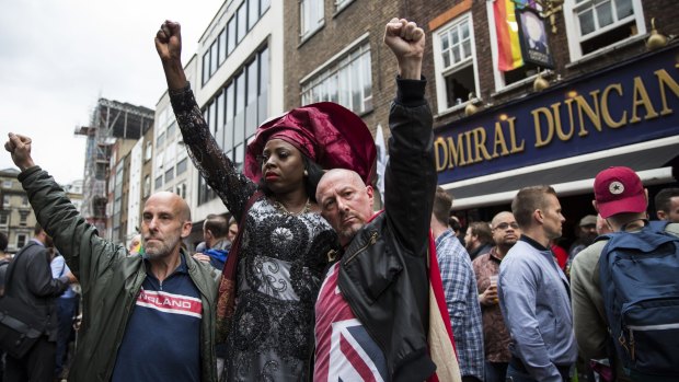Global ties: a defiant crowd flock to Soho in London to express solidarity with the victims of the Orlando attack in June.