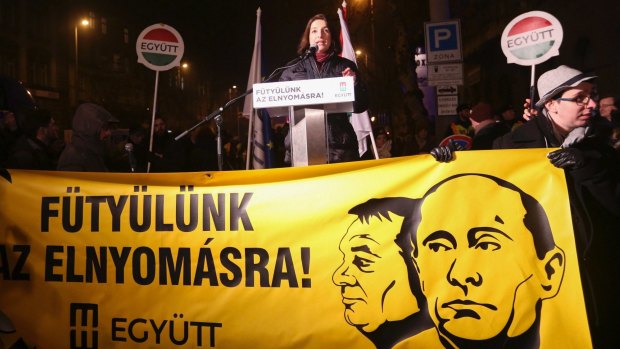 Hungarian opposition party Together (Egyuett) member and independent MP Zsuzsanna Szelenyi speaks during a protest against Russian President Vladimir Putin's visit in downtown Budapest.