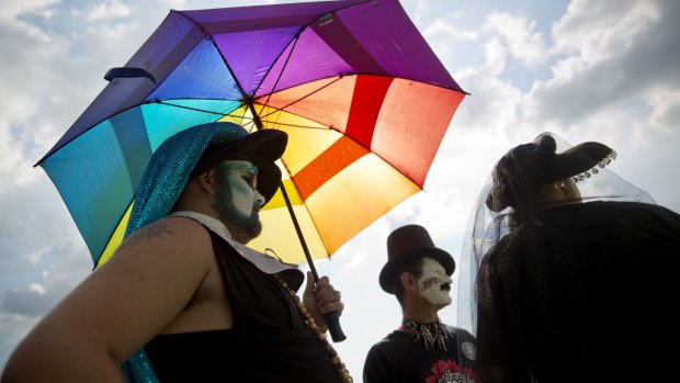 Mourners in in Orlando, where 49 people where killed in a massacre in the Pulse nightclub. 