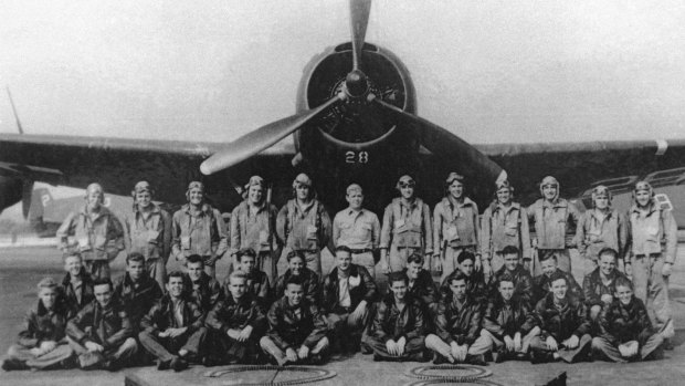 Photograph of Torpedo Bomber #28, the lead plane of Flight 19, known as "Lost Squadron", which vanished on December 5, 1945, off the coast of Florida. The airmen pictured in this June 26, 1945, photo at Fort Lauderdale Naval Air Station in Florida, were not the men who disappeared with Flight 19.
