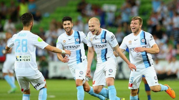 Aaron Mooy of Melbourne is overjoyed after opening his team's account against the Newcastle Jets.