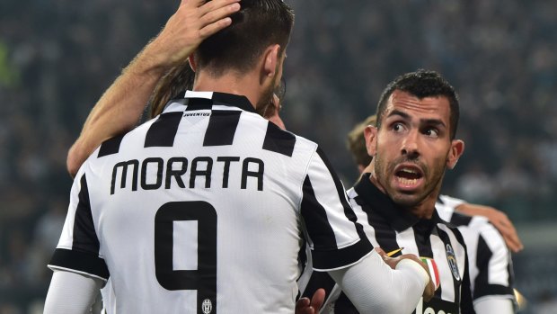 Teamwork: Alvaro Morata is congratulated by Carlos Tevez after applying the finish to the extraordinary move.