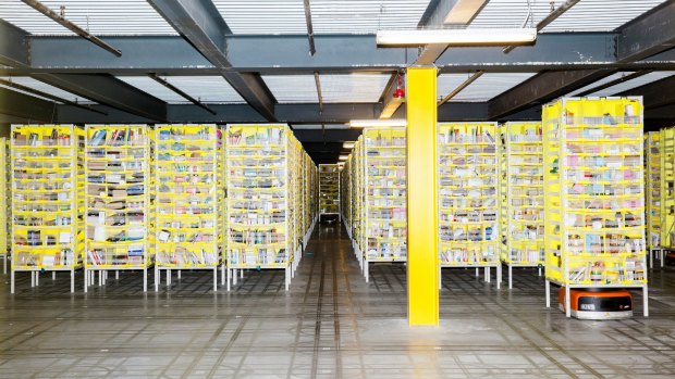 A robot fills orders inside an Amazon fulfilment centre in the US.